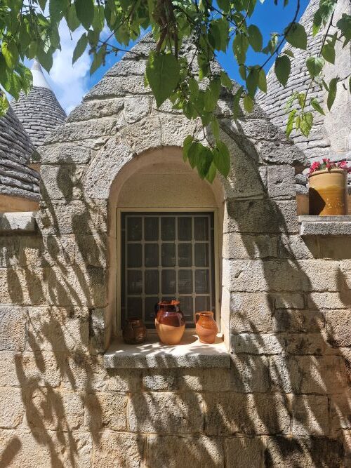 Breakfast and room window at Trullo Santangelo, Ceglie Messapica, Puglia, Italy